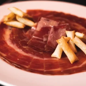 Jamón ibérico cortado y emplatado — Viandas de la Sierra